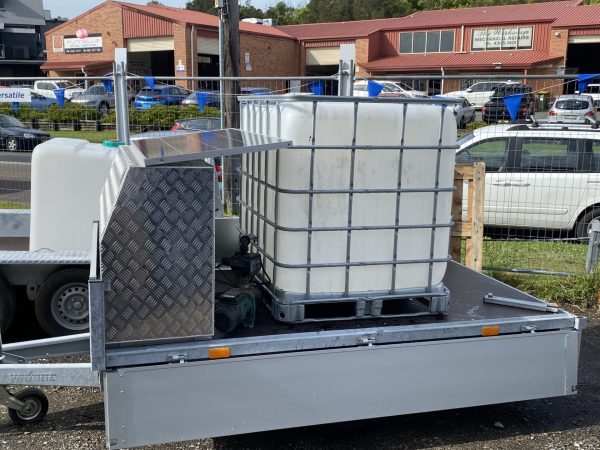 Solar power trailer with a galvanized box, designed for efficient energy storage and transport.