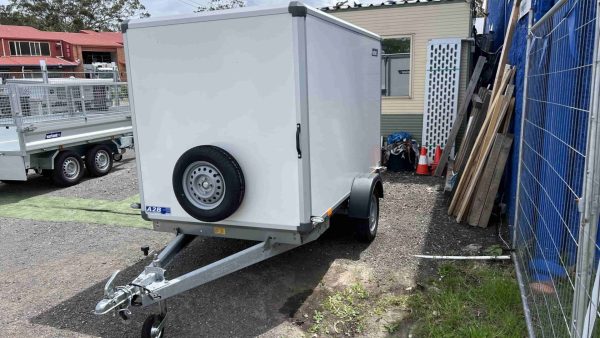 Enclosed motorbike trailer spare tyre